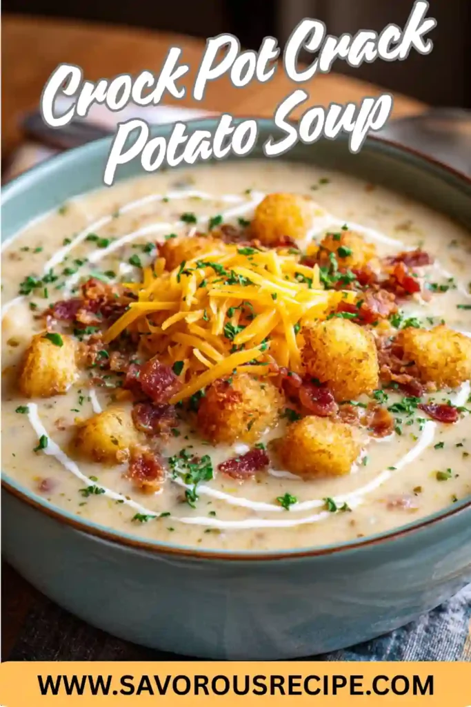 crock pot crack potato soup topped with cheddar, bacon, crispy tater tots, and fresh herbs