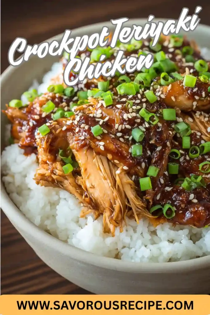 crockpot teriyaki chicken over white rice in bowl topped with sesame seeds and sliced green onions