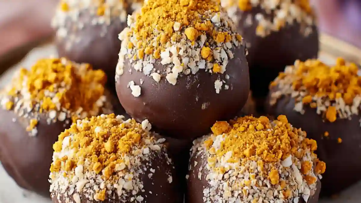 dark chocolate pumpkin truffles topped with crushed oat crumble and pumpkin spice