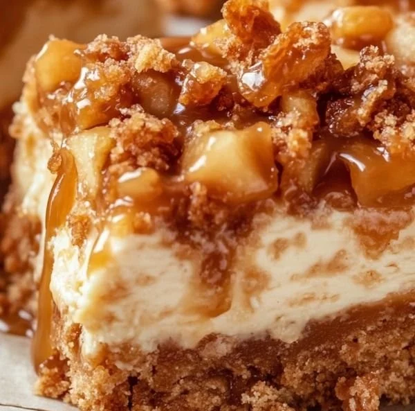 Delicious caramel apple cheesecake bars served on a plate