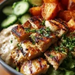 Delicious grilled chicken salad with vibrant veggies and dressing