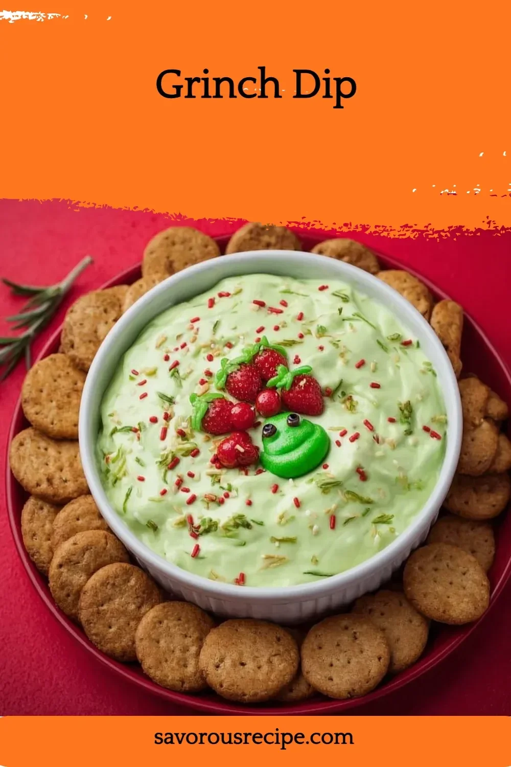 Festive Grinch Dip served in a bowl with Christmas decorations.