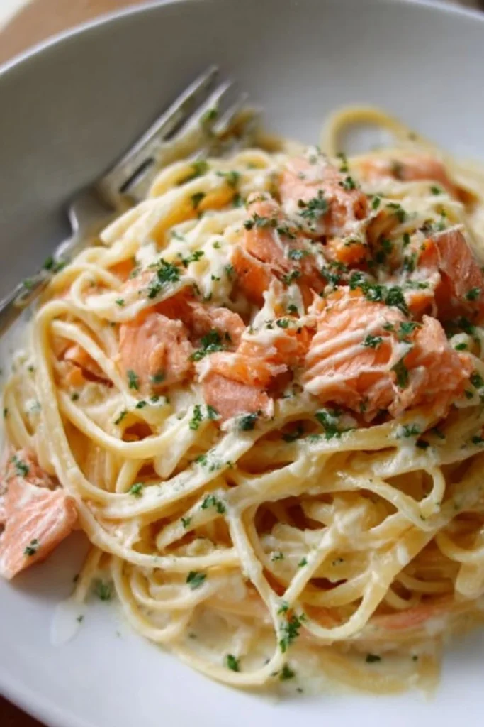 Delicious Smoked Salmon Carbonara dish with creamy sauce and herbs