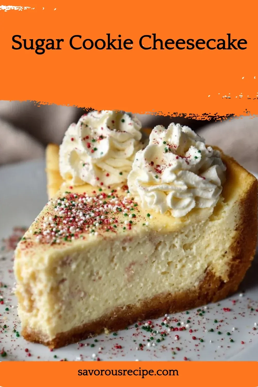 Delicious sugar cookie cheesecake topped with sprinkles and whipped cream.