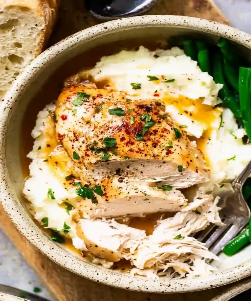 tender cheddar ranch chicken served over mashed potatoes with green beans
