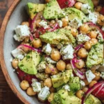 Chickpea Feta Avocado Salad with fresh ingredients in a bowl