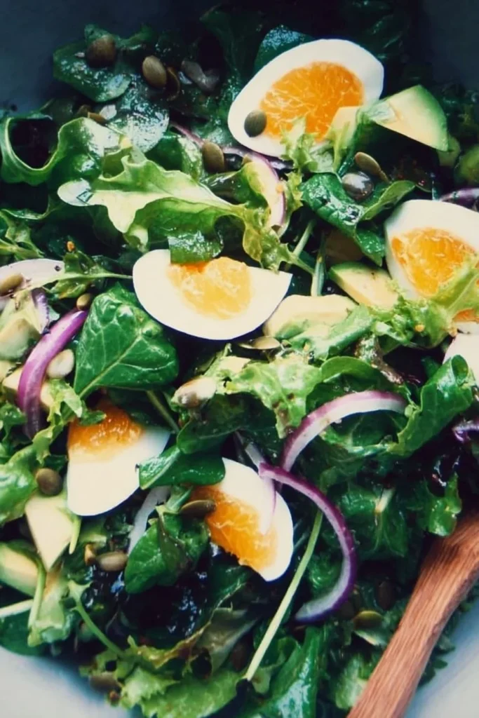 Colorful everyday salad with fresh vegetables and dressing in a bowl