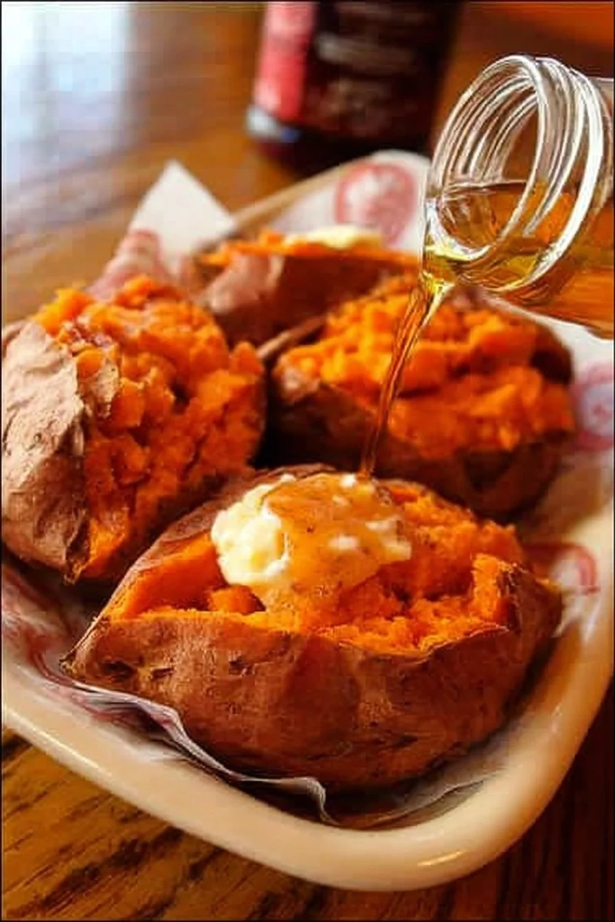 Delicious Texas Roadhouse sweet potato topped with cinnamon and marshmallows