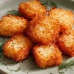 Plate of homemade crispy rice bites, golden and crunchy snacks.