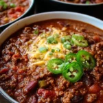 Delicious homemade Dutch Oven Chili served in a rustic bowl