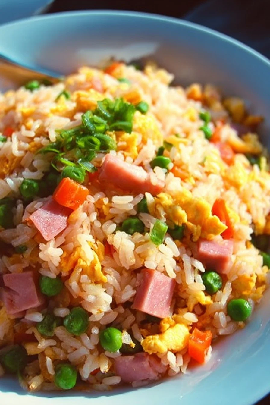 Delicious homemade Ham Fried Rice with colorful vegetables and tender ham pieces.