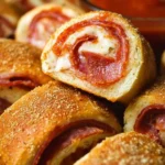 Homemade pepperoni rolls baked to perfection with melted cheese and savory pepperoni.