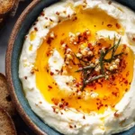 Creamy Ricotta Dip drizzled with Hot Honey served in a bowl