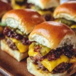 Delicious sheetpan burger sliders served on a platter