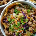 Colorful egg roll bowls with vegetables and dipping sauce