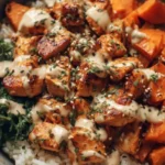 Healthy chicken rice bowl with sweet potatoes and vegetables