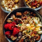 Healthy meal prep breakfast bowls with fresh ingredients and toppings