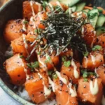 Bowl of flavorful salmon bites served with fresh ingredients