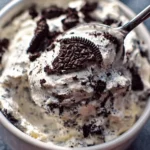 Weight Watcher Friendly Oreo Fluff dessert in a bowl topped with crushed Oreos.