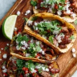 Delicious authentic grilled beef street tacos served on a plate.