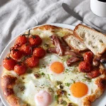 Delicious breakfast in bed served for Mother's Day