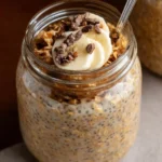 Bowl of brown sugar overnight oats topped with fruits and nuts