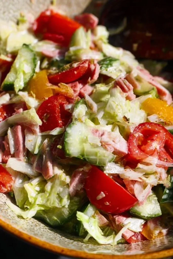 Colorful Grinder Salad with fresh ingredients in a bowl