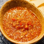 Delicious Pineapple Chipotle Salsa in a bowl with colorful ingredients