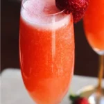 Refreshing Strawberry Bellini cocktail with fresh strawberries and sparkling wine