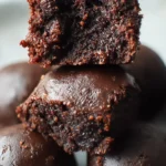 Delicious 3 ingredient brownies ready to be enjoyed with a glass of milk.