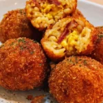 Delicious Bacon Egg Cheese Rice Balls served on a plate