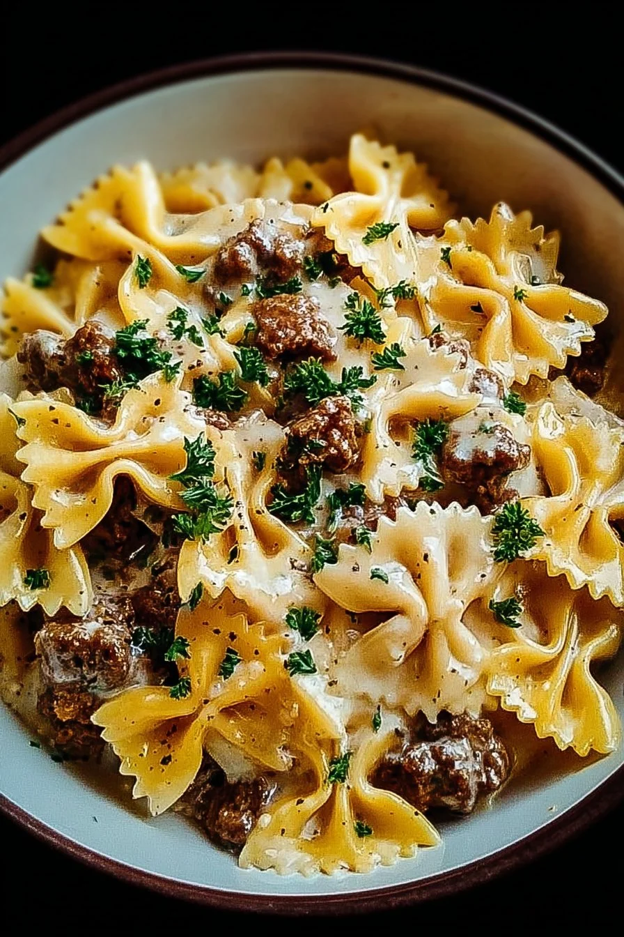 Beef and bowtie pasta served with creamy Alfredo sauce.