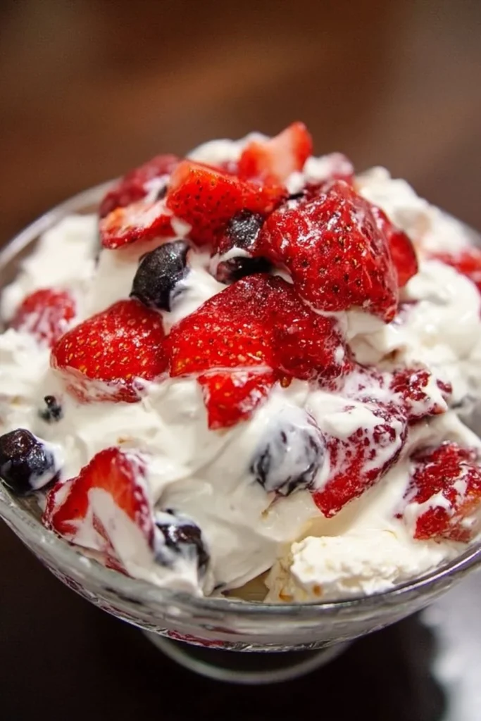 Delicious cheesecake salad with fruits and creamy dressing