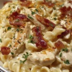 Creamy Chicken Bacon Ranch Pasta with crispy bacon and fresh herbs