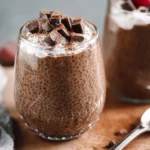 Delicious chocolate chia seed pudding topped with fresh berries
