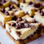 Delicious Chocolate Chip Cheesecake Bars with chocolate chips on top