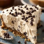 Delicious chocolate chip peanut butter pie with melted chocolate chips and creamy filling.