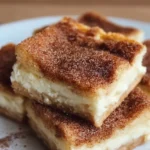 Delicious Churro Cheesecake Bars with cinnamon sugar topping