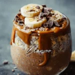Creamy chocolate peanut butter overnight oats in a glass jar