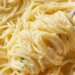 Creamy parmesan garlic angel hair pasta served in a bowl