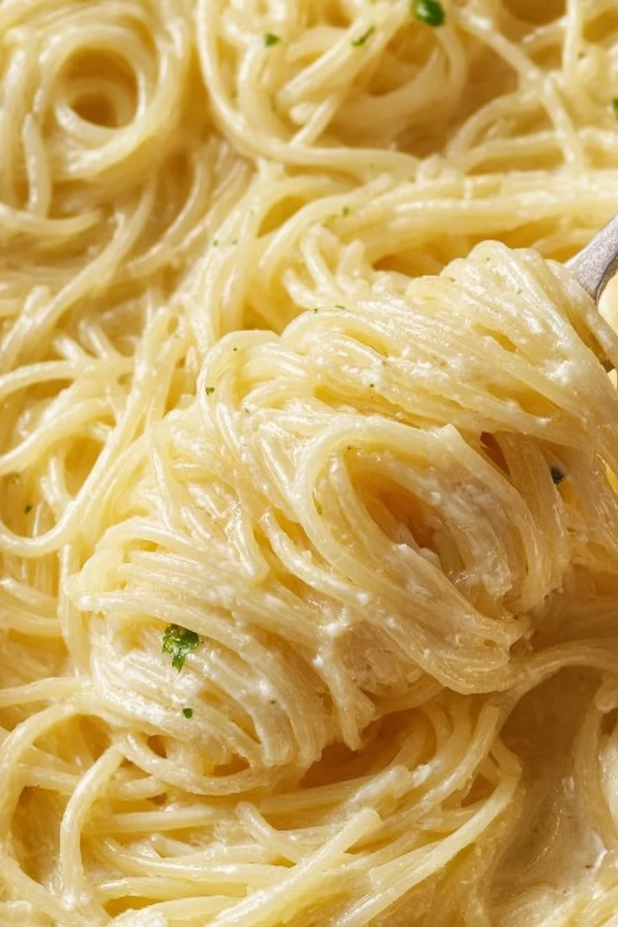 Creamy parmesan garlic angel hair pasta served in a bowl