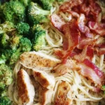 Easy chicken broccoli pasta with bacon dish served in a bowl