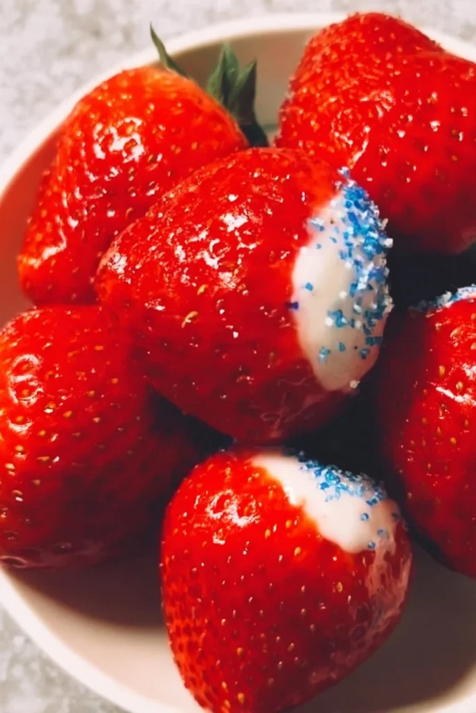 Delicious easy dessert strawberries topped with creamy frosting