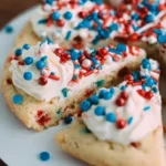 Delicious easy sugar cookie cake with frosting and sprinkles