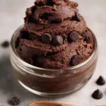 A bowl of edible brownie cookie dough, ready to be enjoyed safely.