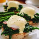 Delicious Eggs Benedict Florentine with spinach and hollandaise sauce
