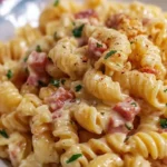 Ham & Cheese Pasta cooked in Instant Pot, ready to serve with cheese and ham