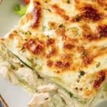 Low Carb Chicken Alfredo Zucchini Lasagna with creamy sauce and vegetables