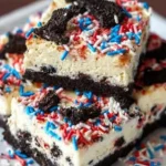 No Bake Fireworks Oreo Cheesecake Bars with chocolate and colorful toppings