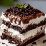 No Bake Oreo Lasagna Dessert with layers of cream and Oreo cookies